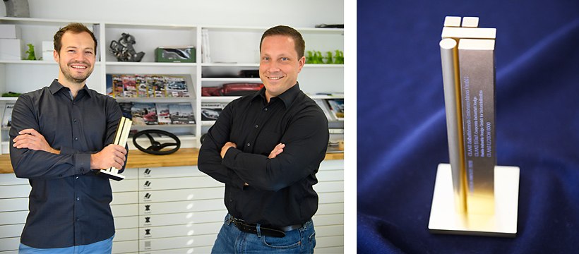 Thomas Wagner (links) und Alain Blind nahmen den iF Design Award für den LEXION Mähdrescher entgegen. -